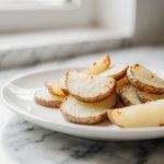 Heerlijke aardappelschijfjes bereid in de airfryer.