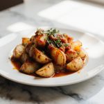Heerlijke patatas bravas bereid in de airfryer.
