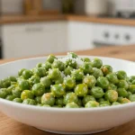 Knapperige peultjes bereid in de Airfryer voor een gezonde snack.